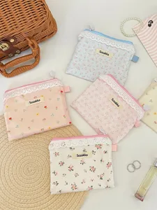 Mini pochettes de rangement à fleurs et dentelle pour monnaie et écouteurs en tons pastel