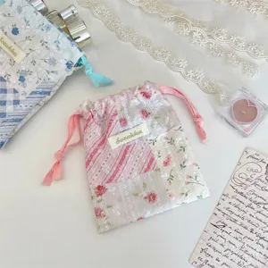 Ins Blumen Karo Patchwork Kordelzug Beutel süße Make-up Schmuck Aufbewahrungstasche