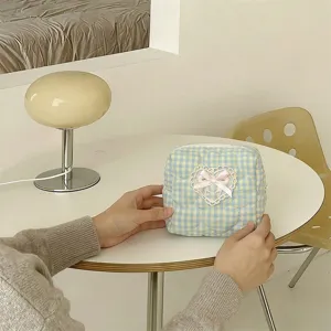Chic blue and yellow plaid quilted cosmetic bag with cute lace heart applique and 3d pink bow.