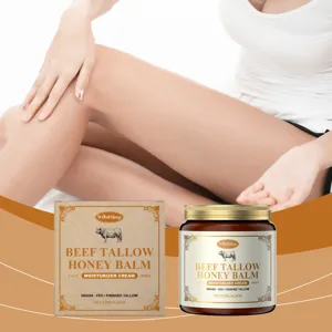 Detailed view of beef tallow honey balm jar and packaging box with skincare application.