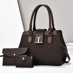 Set di borsa a mano in tela marrone scuro con portafoglio coordinato per donne.