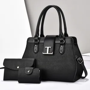Elegante set di borse a mano in pelle nera con borsa portafoglio e porta carte dettaglio
