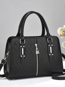 Elegant black structured handbag featuring rhombic embossed pattern and gold-tone hardware