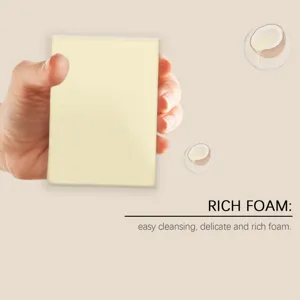 Detailed view of the herbal tallow moisturizing soap, showing its smooth texture and shape.