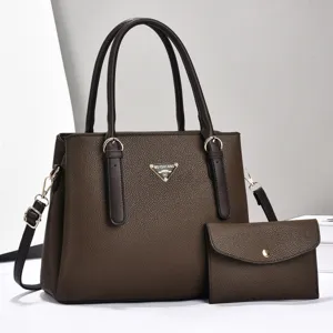 Brown soft leather tote bag set with detachable shoulder strap and matching clutch.