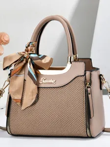 Elegant women's tote handbag with scarf accessory, PU leather and woven texture design.