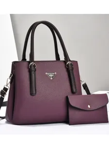 Purple soft leather tote bag with matching pouch, stylish multi-compartment shoulder handbag.