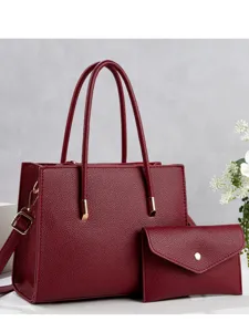 Wine red tote bag set for women, large capacity leather handbag with matching clutch and strap.