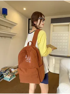 Japanese style plaid school backpack for students, large capacity casual daily rucksack.