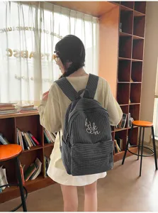 Casual Japanese Harajuku plaid large capacity student school backpack with cute embroidered letters.