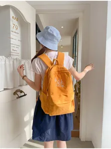 Japanese style plaid large capacity school backpack for girls and students daily use