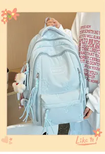 Zaino ricamato stile college carino con grande capacità, ciondolo orsetto e nappine.