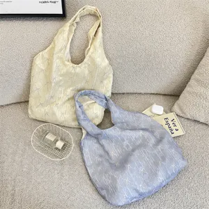 Chic bow textured shoulder bag, aesthetic canvas tote bag for women, casual summer handbag.
