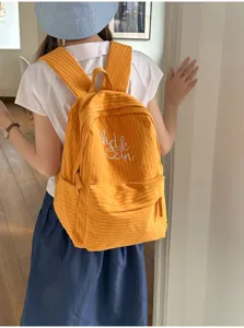 Casual plaid student backpack for teenage girls large capacity school bookbag with embroidery.