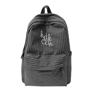 Japanese style plaid large capacity student school backpack, chic grid backpack for daily use.