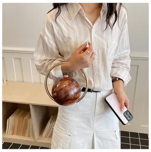 Acryl bol avondtas met gouden metalen ring handvat, unieke marmerpatroon crossbody tas.