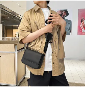 Borsa a tracolla elegante in pelle PU con tasca per uomini, ideale per viaggi e lavoro.