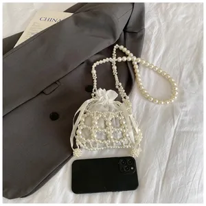 Elegant pearl beaded bucket bag, hollow out mesh shoulder crossbody bag for women.