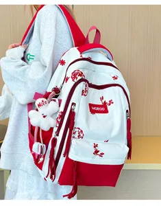 Grande zaino da scuola rosso e bianco, con ricamo floreale e grazioso ciondolo.