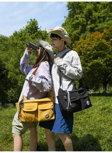 Waterproof nylon messenger bag for students, casual crossbody shoulder bag with multi pockets.
