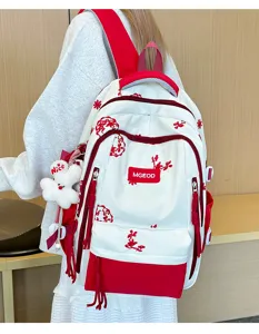 Zaino scolastico grande capacità stile college con dettagli di ricamo floreale.
