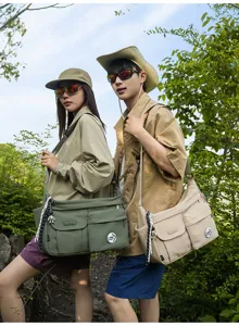 Casual nylon messenger bag for students, multi-pocket crossbody shoulder bag for daily use.