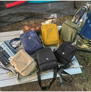 Outdoor casual canvas crossbody bag in multiple colors and grid patterns, perfect for daily comm.