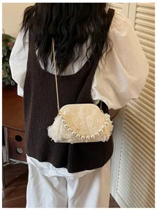 Exquisite sweet style white kiss-lock evening bag featuring floral details and elegant pearl handle.