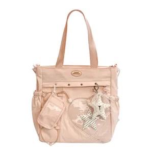Bolso tote de lona rosa con ventana transparente de corazón, dijes de estrella y gran capacidad.