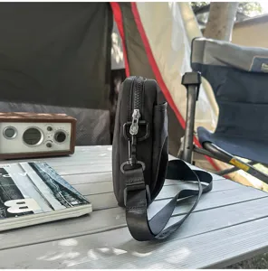 Stylish black outdoor cross-body bag, casual shoulder bag for commuting, travel and daily hiking.