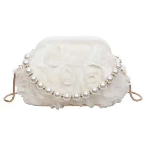 Elegant white fabric flower evening bag with pearl handle and gold chain for women chic party.