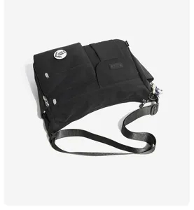 Detailed view of black nylon messenger bag, multi-pocket crossbody design, durable strap.