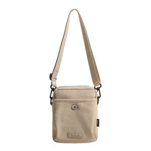 Casual nylon crossbody bag for daily commute, lightweight khaki shoulder bag with adjustable strap.