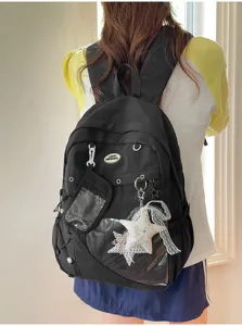 Mochila escolar de gran capacidad estilo ins japonés con bolsillo transparente y colgantes.