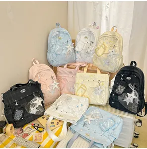 Mochila escolar de gran capacidad de estilo niña bonita japonesa con bolsillo y colgante.