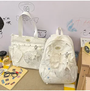 Bonito juego de mochila escolar y bolso tote de lona estilo ins japonés para chicas.