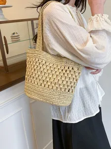 Sac cabas creux tissé en paille fait main, sac d'épaule décontracté pour vacances de plage.
