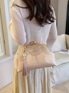 Borsa a tracolla vintage ricamata con chiusura a bacio da donna elegante pochette vista principale