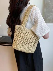 Sac cabas ajouré en paille tissée minimaliste, élégant sac d'épaule plage été pour femmes.