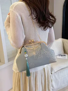 Borsa a tracolla da sera ricamata in stile cinese retro con chiusura a bacio per donne.