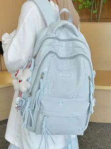 Zaino scolastico stile college ricamato di grande capacità per studenti, azzurro chiaro.