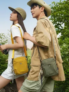 Fashion outdoor casual crossbody bag for men and women, stylish commuter shoulder travel pack.