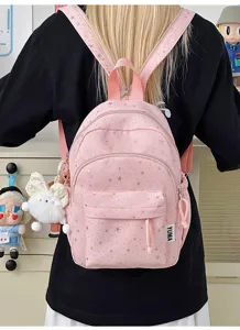 Roze rugzak met sterrenprint voor dames, schattige casual schooltas met pluche hanger.