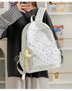 Cute star nylon school backpack for girls, large capacity casual daypack with sweet design.