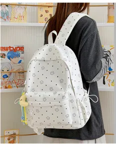 Stylish nylon student school backpack with cute star print and large capacity for daily use.