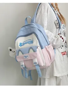 Cute color block backpack with cat ear pocket design, detailed view showing stylish letters print.