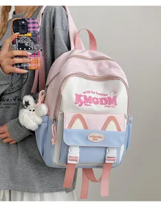 Close-up of cute colorblock school backpack with cat ears detail and stylish letter print.