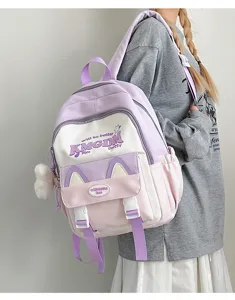 Cute color-block student backpack with cat ears and large capacity for school and daily use.
