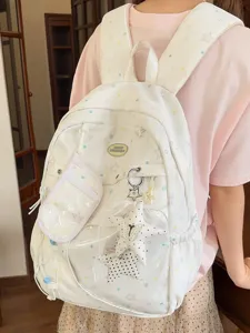 Mochila escolar de gran capacidad estilo japonés lindo para niñas con patrón de estrellas y dijes.
