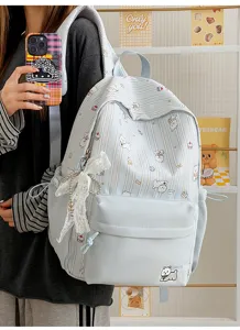Cute Japanese style dog print large capacity school backpack for students, light blue casual daypack.